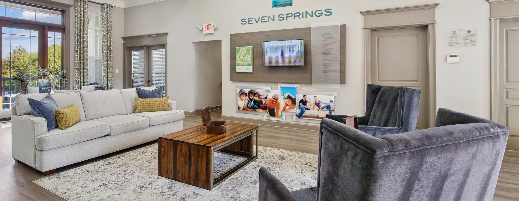 a living room with a sitting area