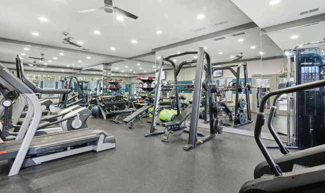 a gym with treadmills