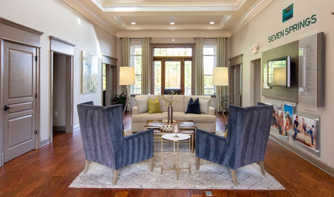 Resident lobby with plush chair seating.