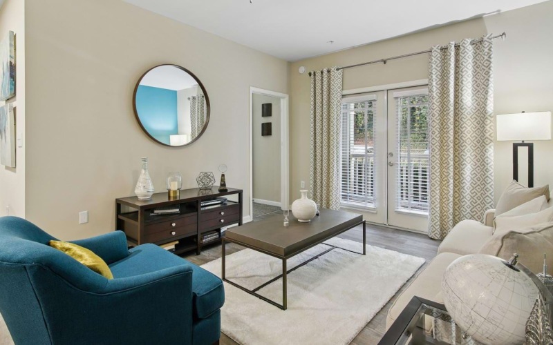 a living room with a blue chair