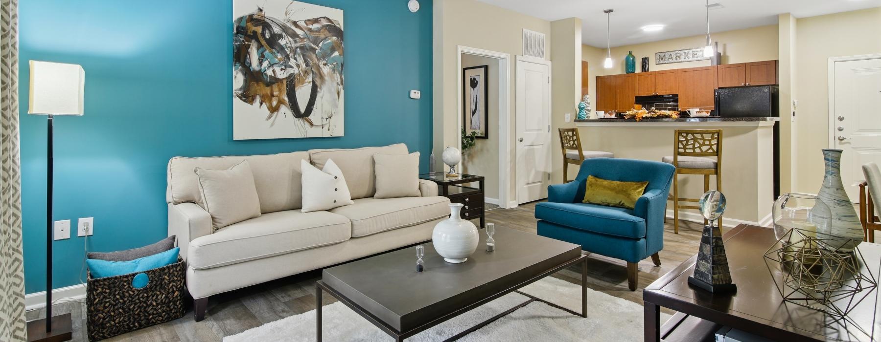 a living room with a couch and a table
