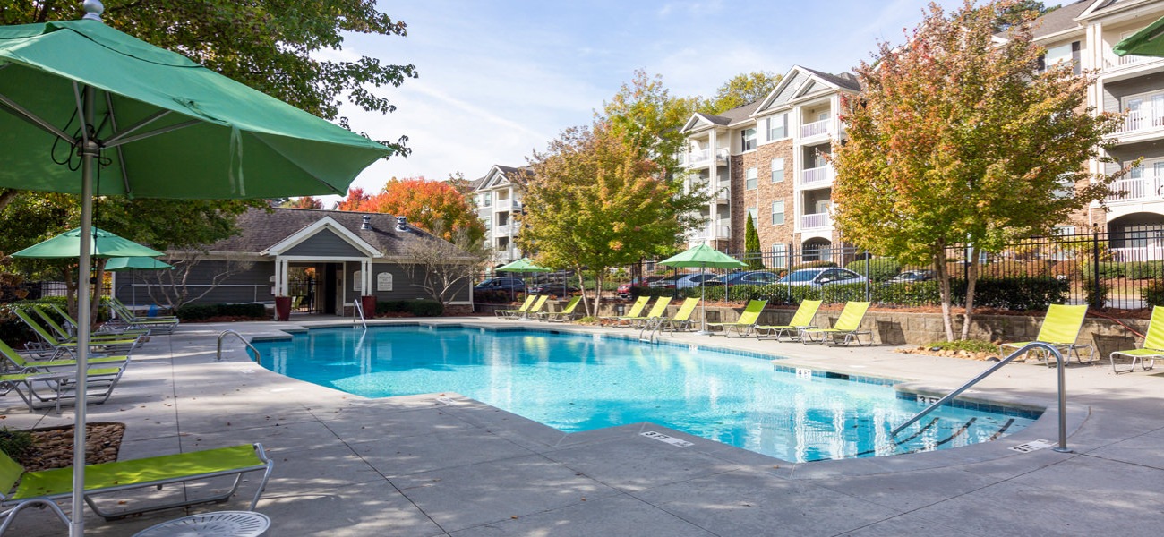 Large swimming pool with pool side seating